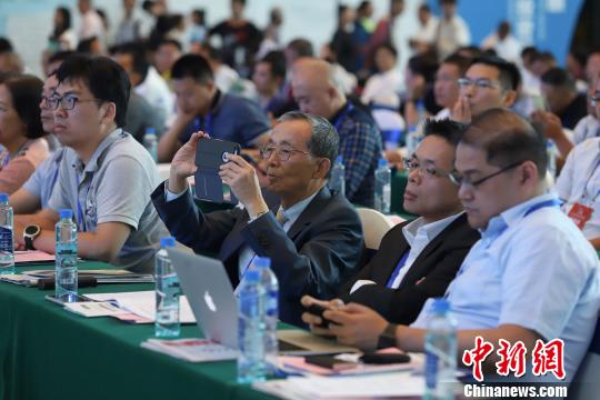 研討會現(xiàn)場圖?！■暮陚?攝